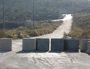 Barrier between Beit Ur al-Fauqa and Route 443 186x140.jpg